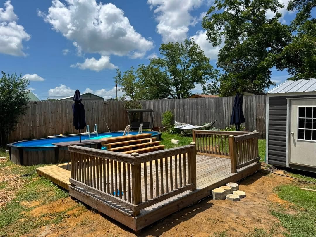 A completed wood deck built for a local homeowner