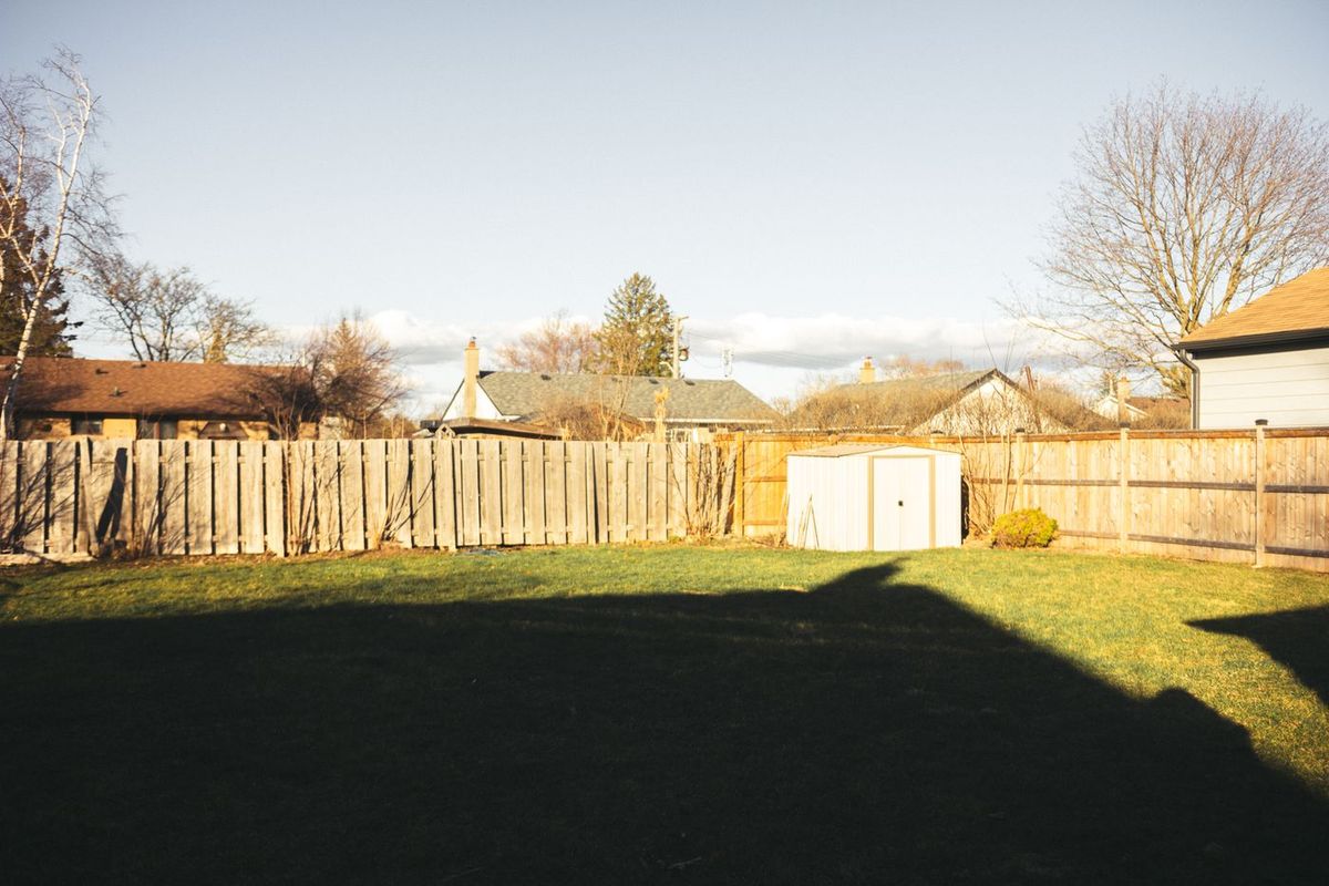 Wood privacy fence around a residential yard